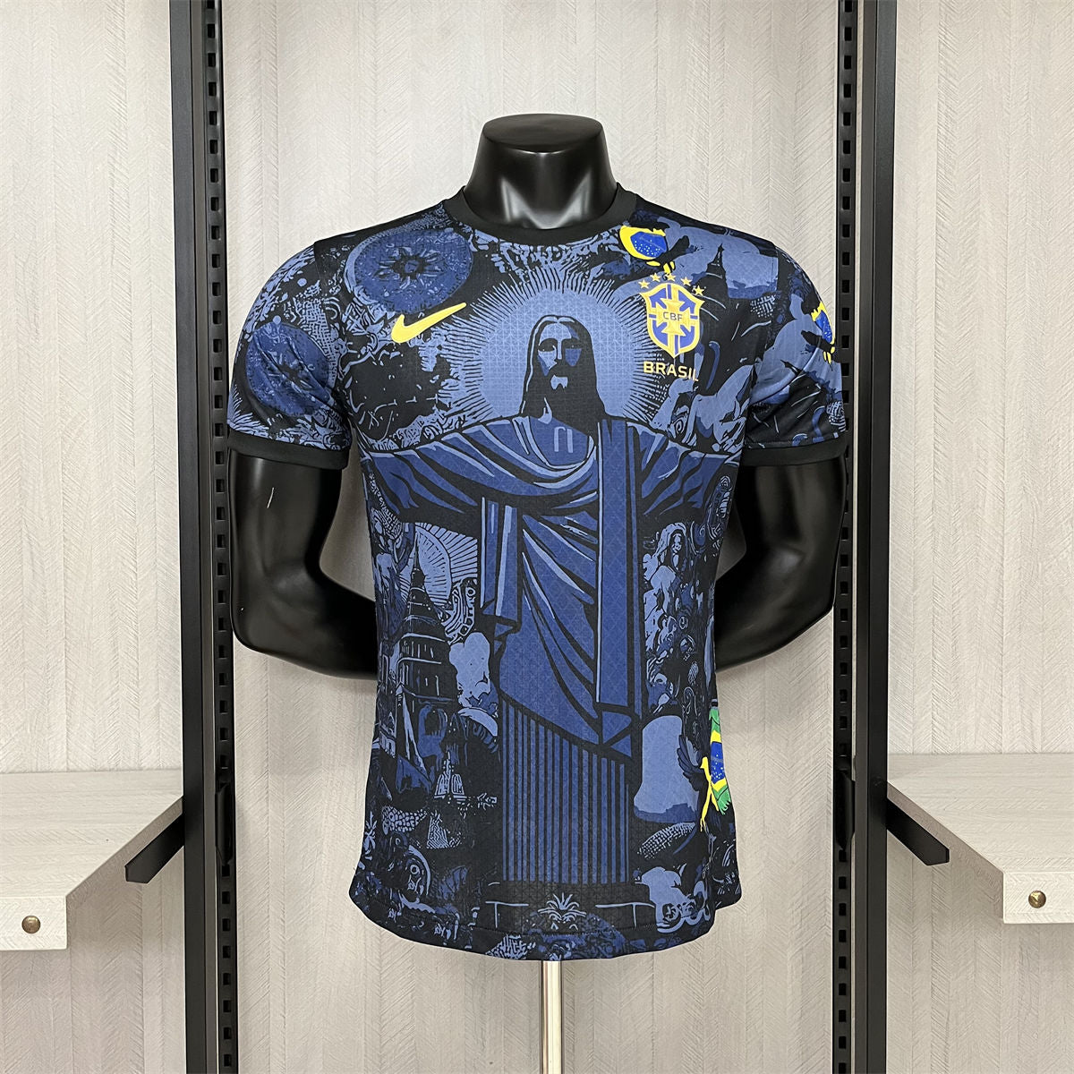Maglia da calcio blu con stampa di Cristo Redentore.